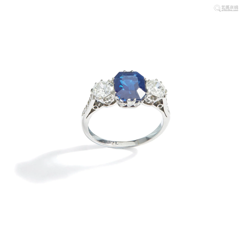 A sapphire and diamond three-stone ring