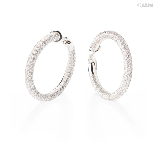 A pair of diamond hoop earrings, by Chaumet