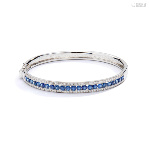 A sapphire and diamond bangle, by Mappin & Webb