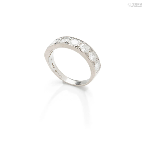 A diamond half-hoop ring