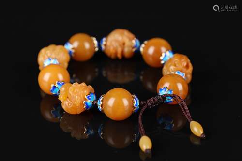 A Pair Of Two Bewax Carved Lion Bracelet