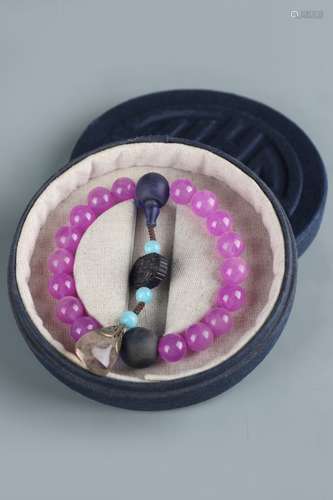 A Purple Gemstone Beads Bracelet