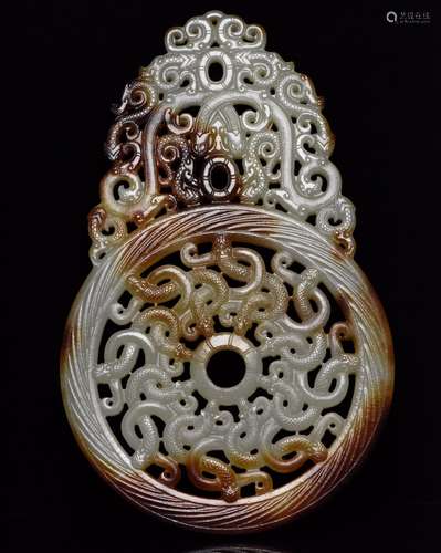 A Jade Carved Dragon Pendant