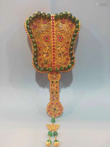 A Gilt Filligree Fan With Gemstone