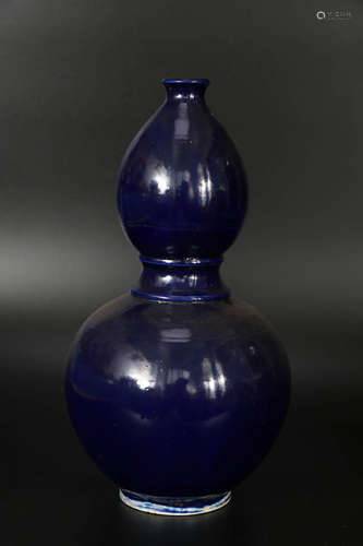 A Dark Blue Glazed Procelain Gourd Bottle