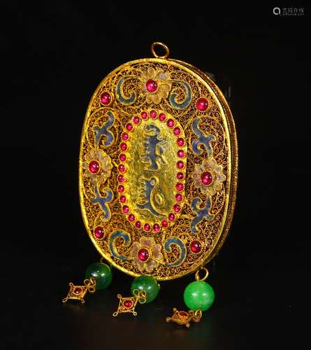 A Gilt Filigree Gold And Gemstones Fasting Pendant