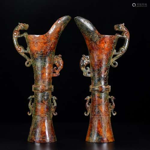 A Pair Of Jade Carved Wine Vessels