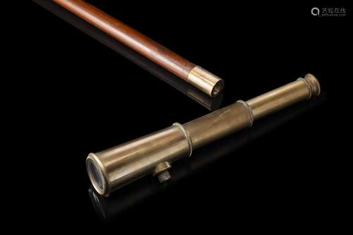 A 20th-century navy wooden walking stick with telescope shap...