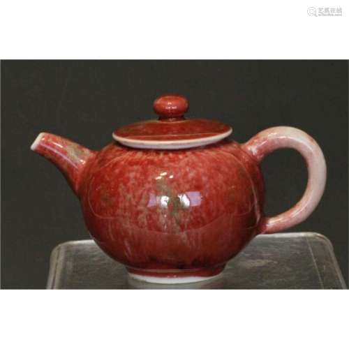 a chinese red glazing tea pot