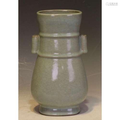 A celadon double handles vase