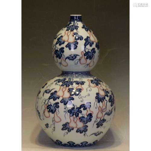 a blue and white vase