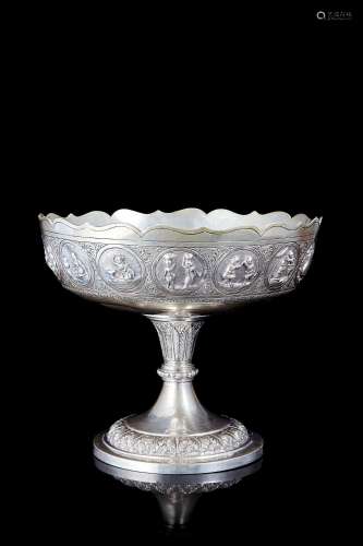A silver stand decorated with medallions and life episodes (...