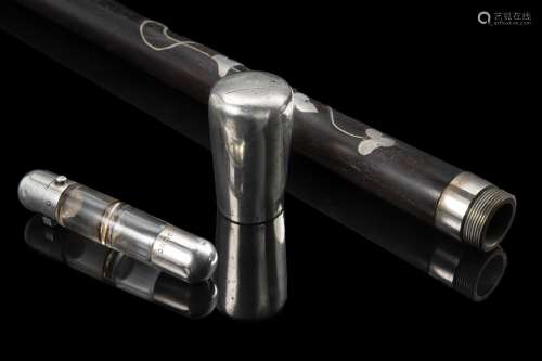 An ebony silver inlaid walking stick with silver handle, tit...