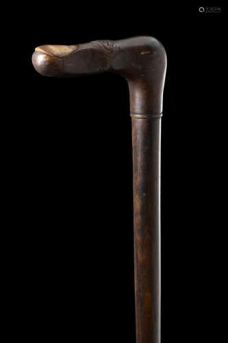 An early 20th-century duck call malacca walking stick with a...