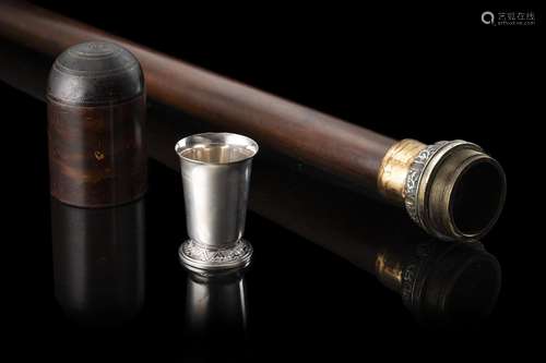 A rosewood walking stick with tortoiseshell handle and silve...