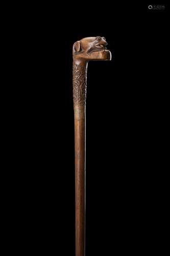 A 19th-century French wooden walking stick with frog shaped ...