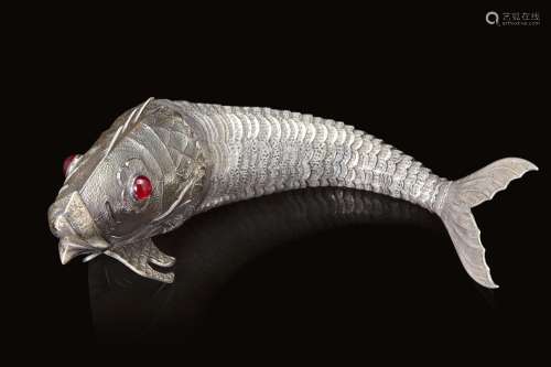 Articulated fish with red glass paste eyes. Silversmith Lope...