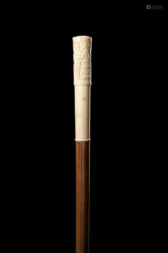 A 19th-century Dutch malacca walking stick with ivory handle...
