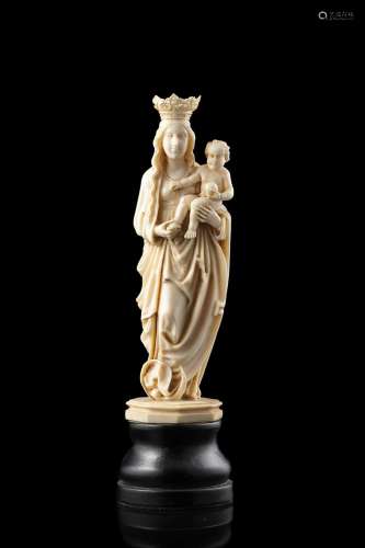 A 19th-century ivory sculpture representing "Virgin and...