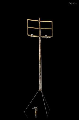 A 19th-century musician lacquered metal walking stick with a...