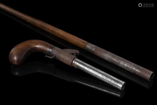 A 19th-century European defense malacca walking stick enclos...