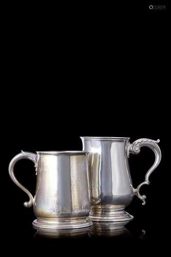 A lot comprising two different silver jugs. London, 18th cen...