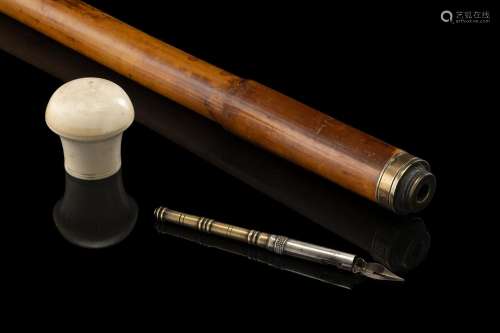 A bamboo walking stick with an ivory handle hiding a writing...