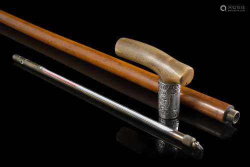 An early 20th-century malacca walking stick with horn handle...