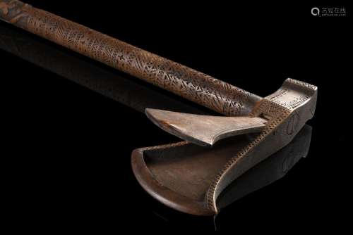 A carved wood walking stick hiding a snuff box in the handle...