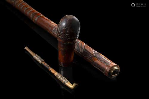 A carved bamboo walking stick with a detachable knob hiding ...