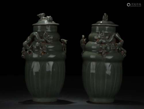 A Pair of Lidded Vases