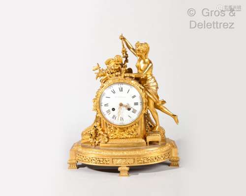 Pendule en bronze ciselé et doré représentant Vénus debout s...