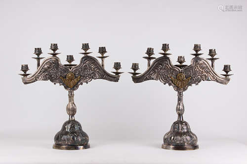 A pair of seven light Colonial chandelabras circa 1900 in si...