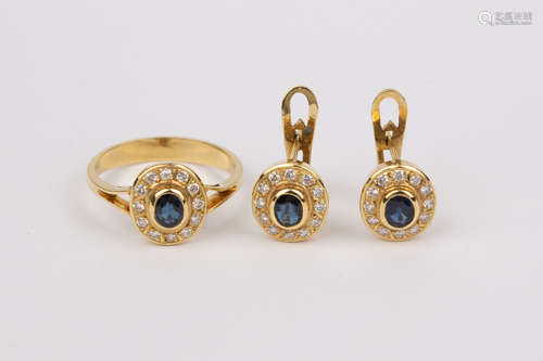 A set of 18k. yellow gold, sapphires and diamonds cluster ri...