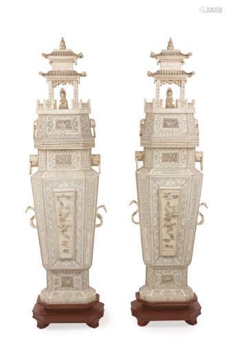 A 20th century Chinese school. A pair of carved ivory pagoda...