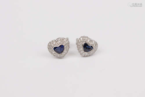 A pair of heart shaped stud earrings