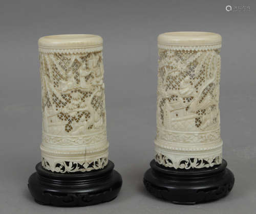 A pair of Chinese Canton carved ivory brush pots circa 1900