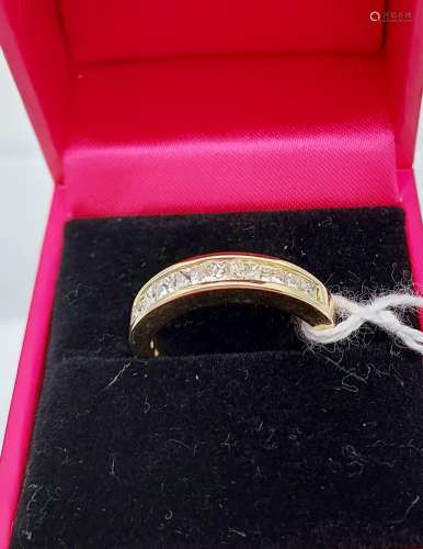 An 18ct yellow gold diamond half eternity ring [60 points ap...