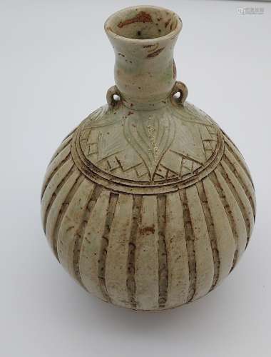 A 19th century Korean vase, finished in a celadon green glaz...