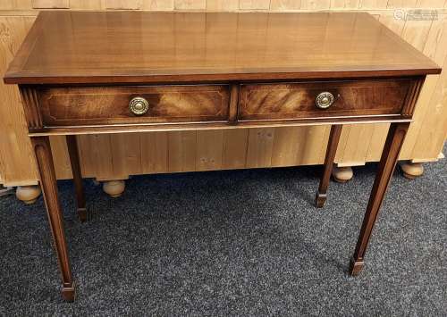 A Reproduction antique style mahogany console table fitted w...