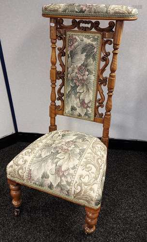 A 19th century prie dieu prayer chair.