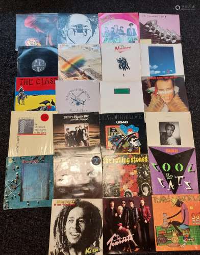 A Collection of records to include ELO, Bob Marley, Squeeze,...