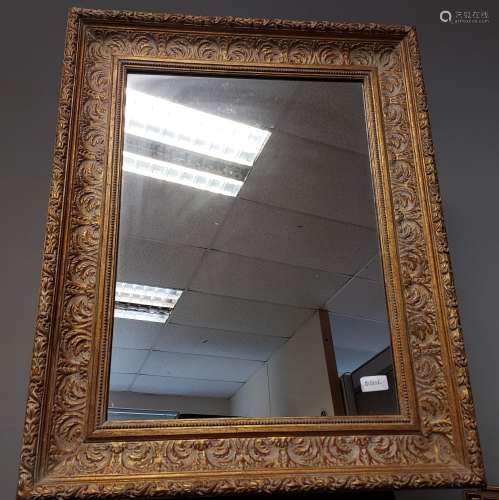 An Antique style gilt wooden frame mirror.