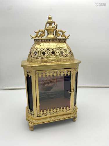 A gold painted Metal and Stainglass panel lantern, fitted wi...
