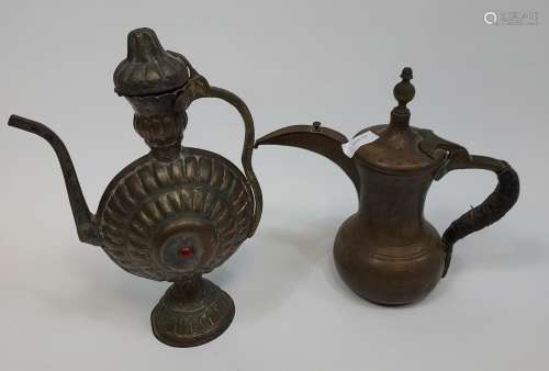 Two antique Turkish copper coffee pots.