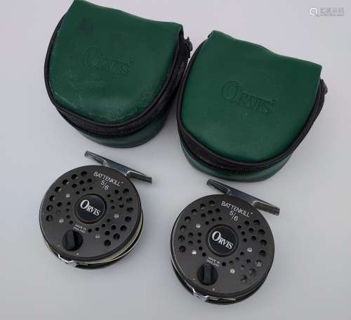Two Orvis Battenkill 5/6 fly reels with line and pouches.