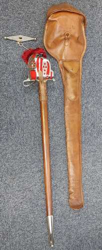 A Military King George V Cavalry sword with scabbard. Produc...