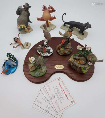 A Selection of Disney Jungle book figurines together with Da...