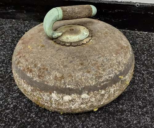 Antique curling stone with handle