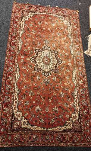 Antique ornate wall hanging rug.